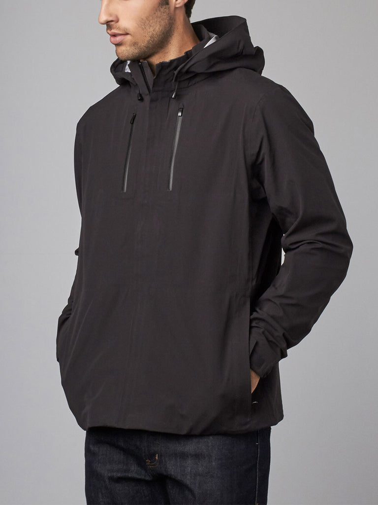 The Cubed® Travel Jacket: A Waterproof Shell for Everyday