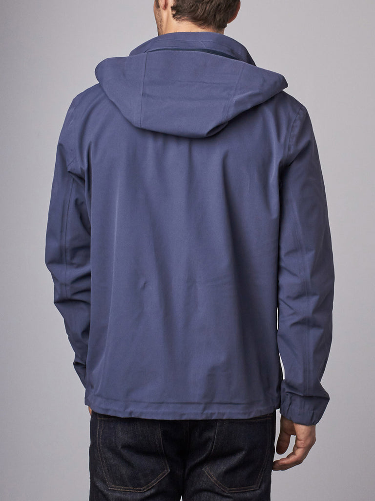 The Cubed® Travel Jacket: A Waterproof Shell for Everyday